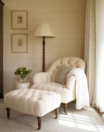 Elegant lounge chair paired with soft cream tones.